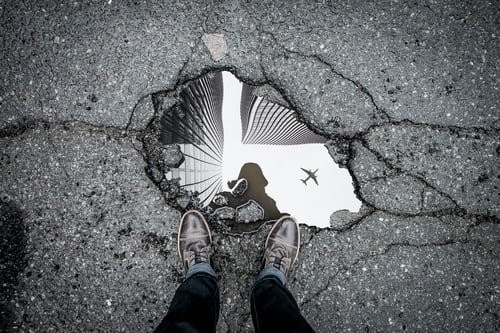 A body of water reflecting a person